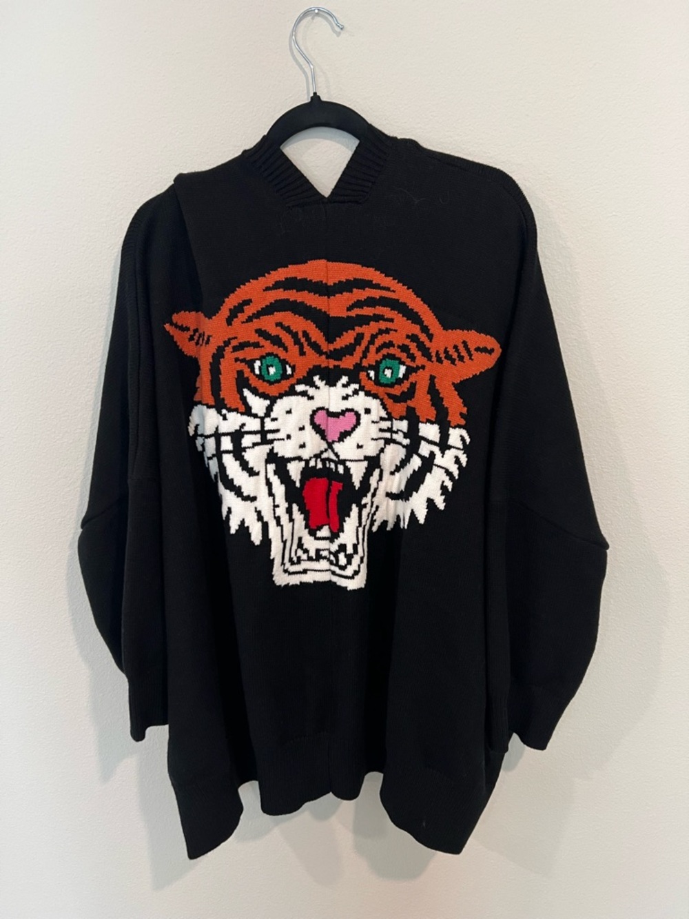 Dressed in LALA Black V‑Neck Sweater with Orange Tiger Face